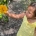 Tribal toddler exploring a garden